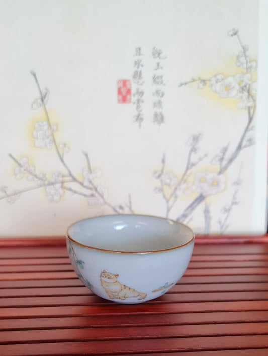 Chat de tasse de thé IV